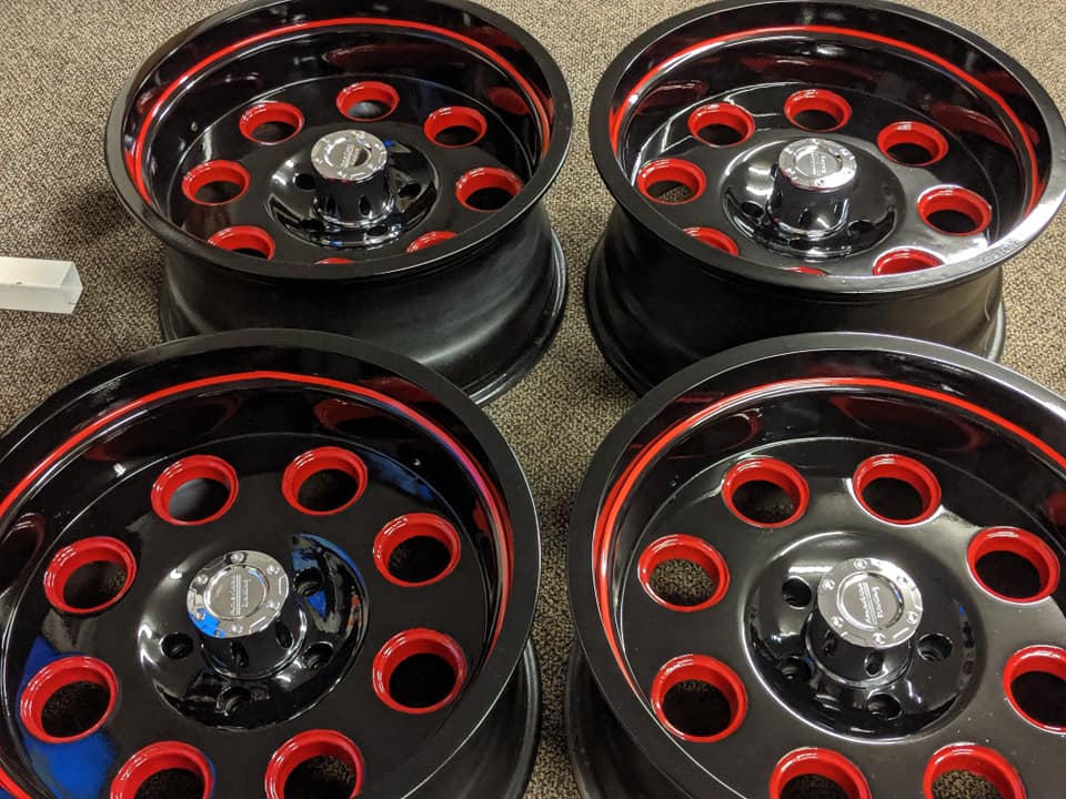 Red and black rims for truck